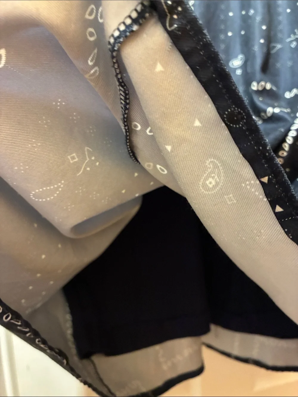 Harper Navy Blue Midi Skirt with bandana or paisley print pattern. It has lining